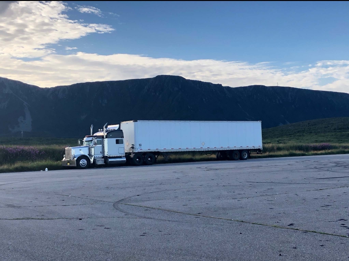 ARJ Logistics tractor and trailer on the road in Atlantic Canada