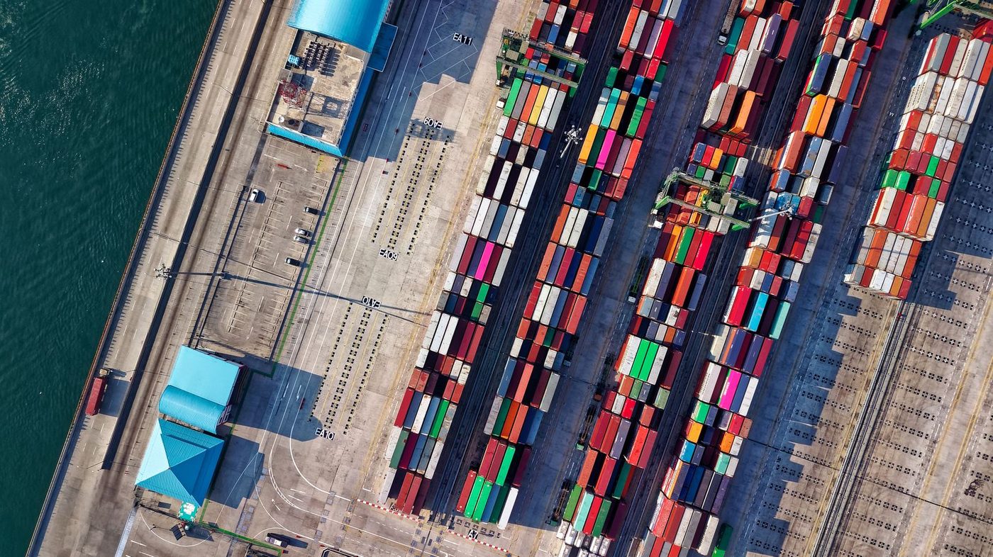 Intermodal shipping containers stacked at an Atlantic Canada port terminal